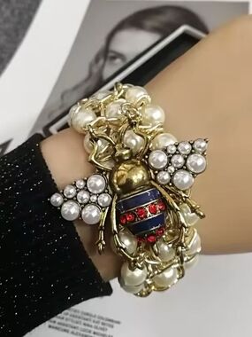 Gold Pearl Bee Bracelet with Red and Blue Accents